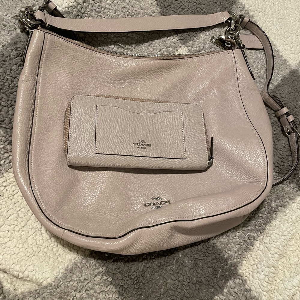 Gray Coach crossbody bag with matching wallet